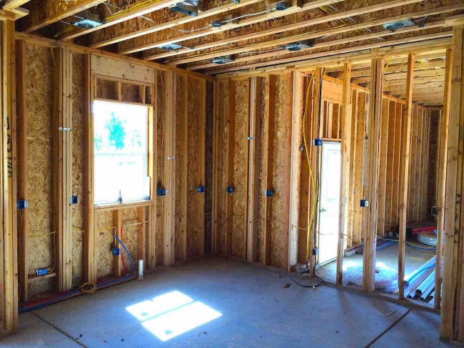 Wooden Framing with Vertical Studs and Sheathing